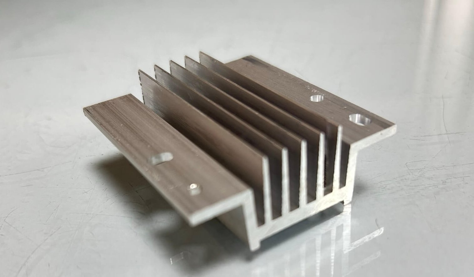 Read more about the article What Are Aluminum Extrusions for AI Equipment? What Are the Manufacturing Processes?